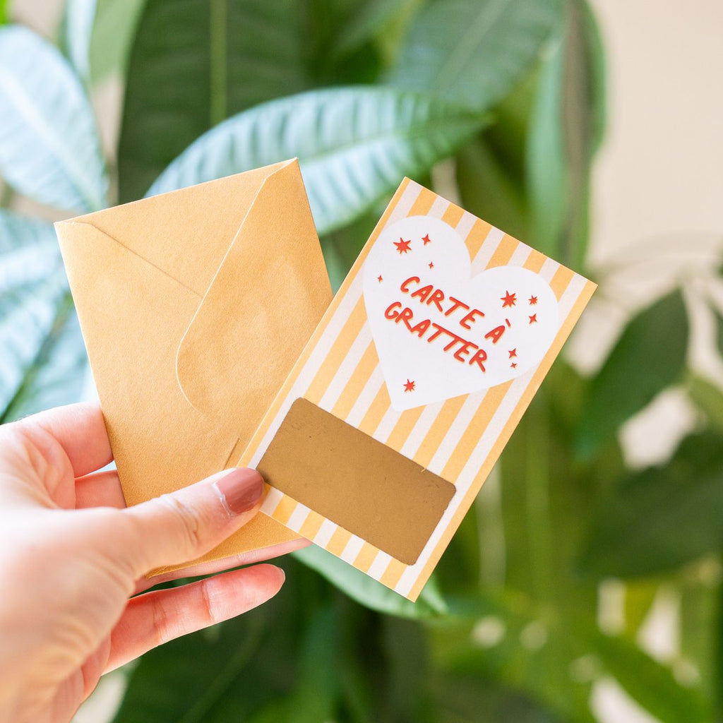 Carte à gratter, message caché sous la zone dorée à gratter