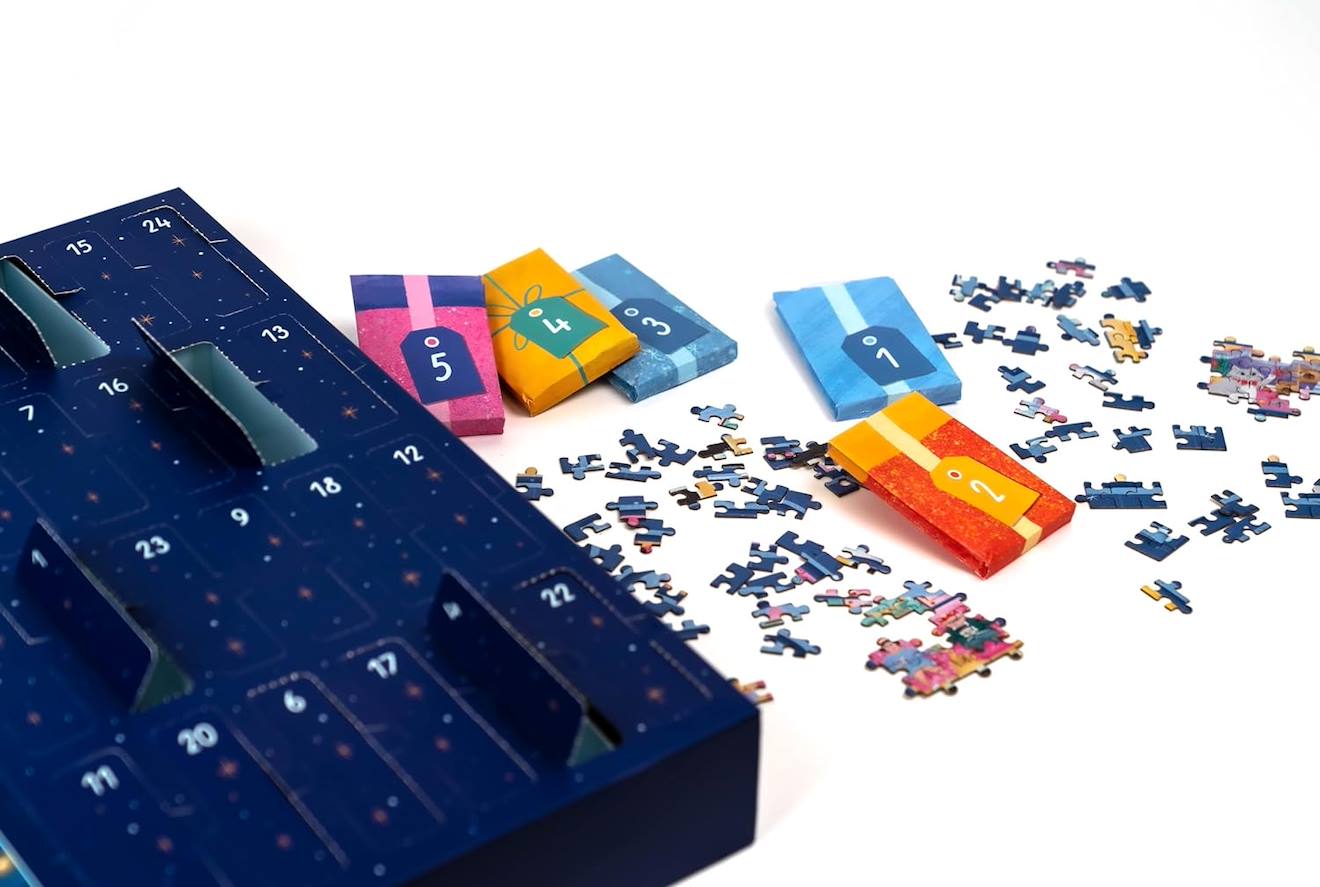 24 puzzles de 50 pièces - calendrier de l'avent noël à travers la fenêtre bleu
