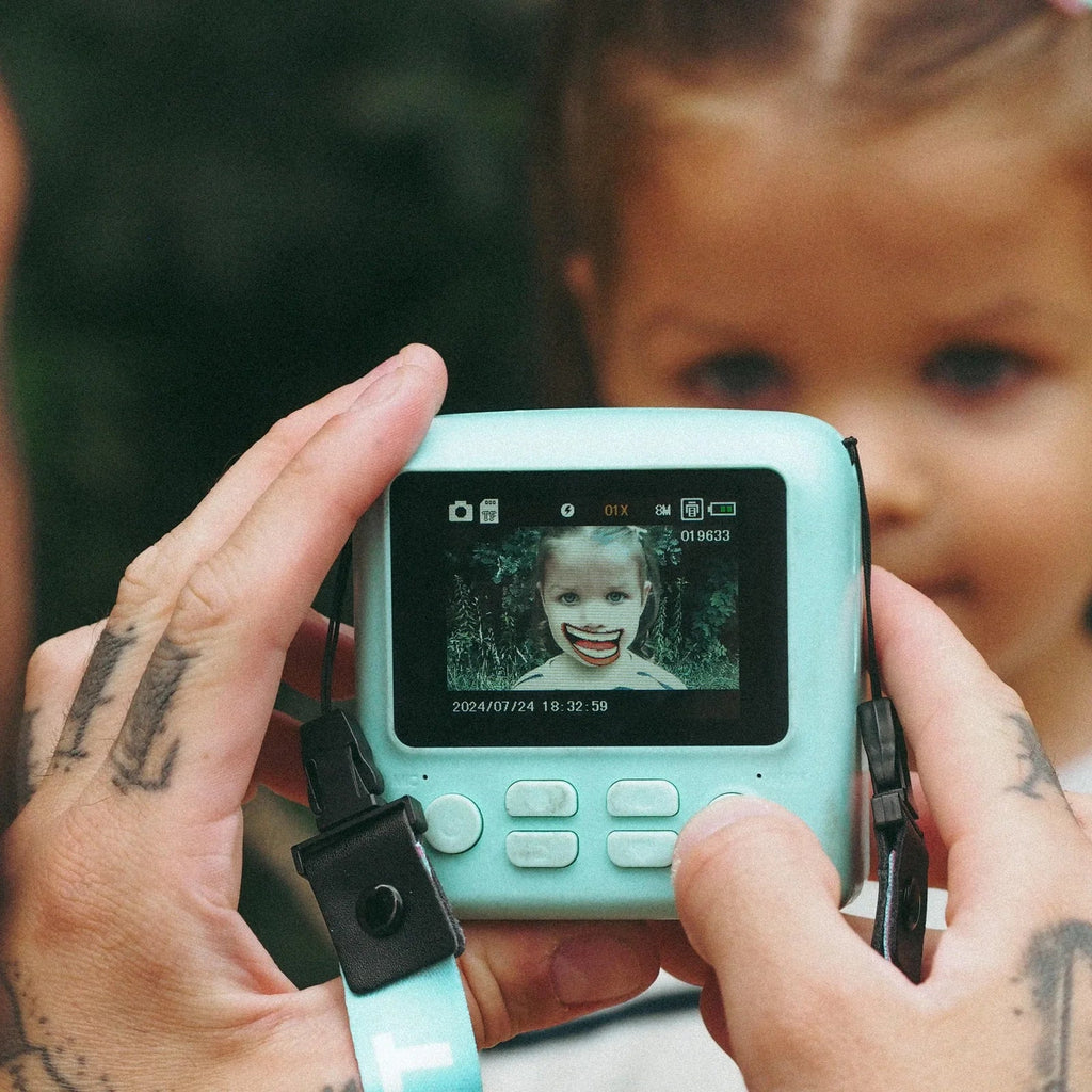Appareil photo instantané enfant et rouleaux de papier