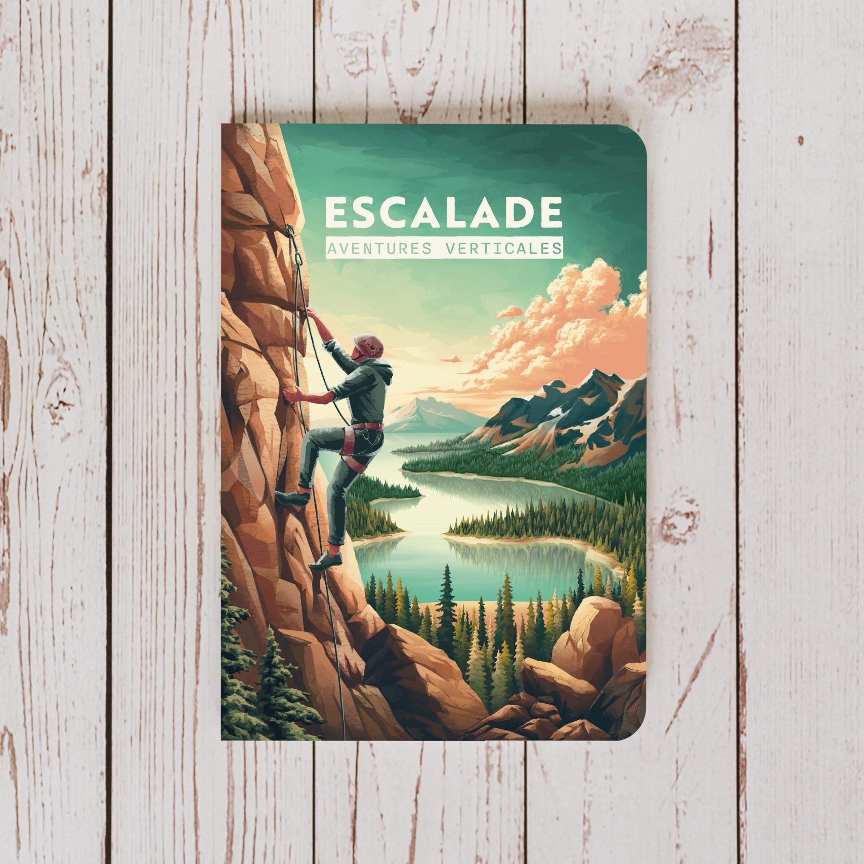 Carnet d'escalade ouvert, pages blanches et couverture texturée