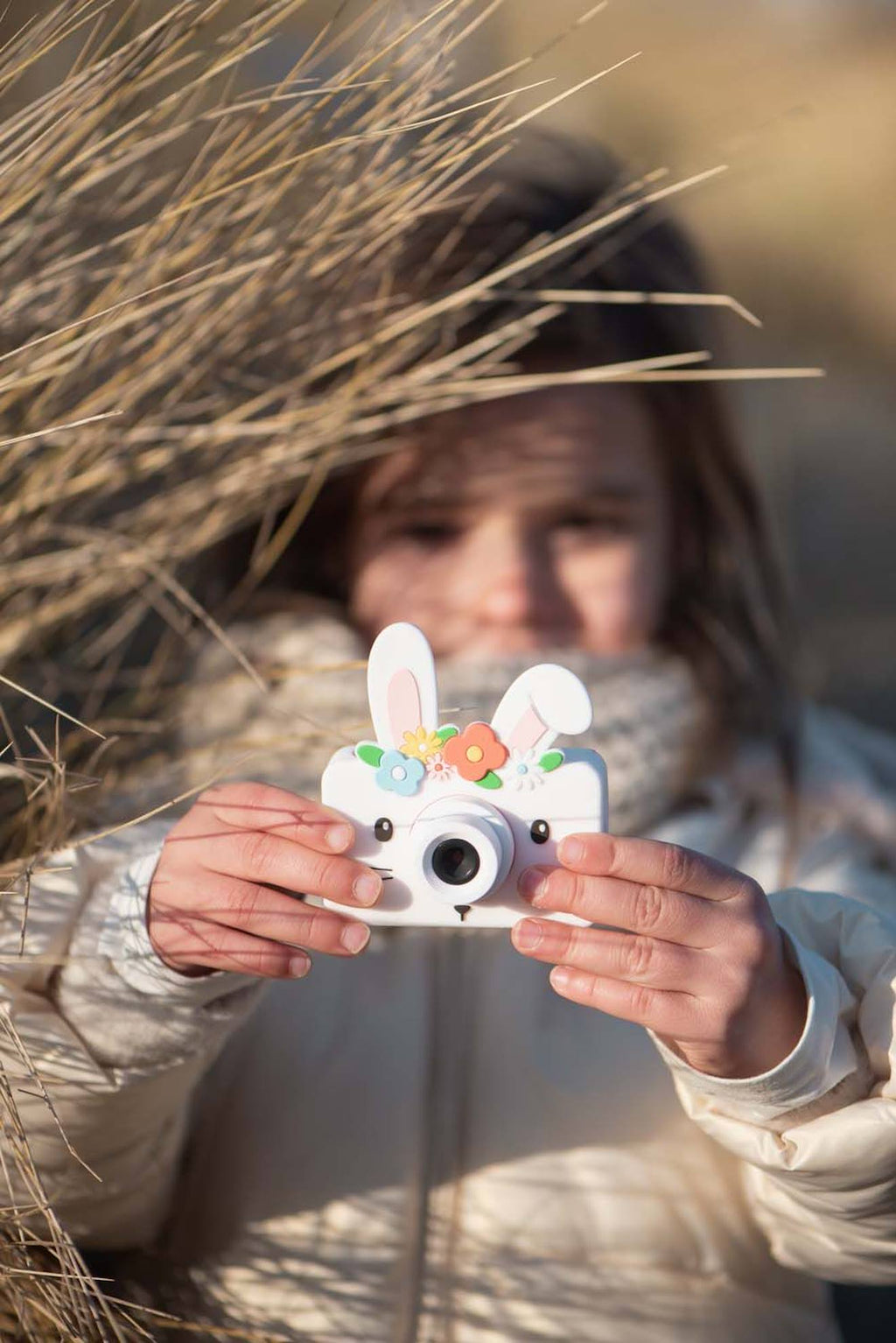 Appareil photo lapin des fleurs blanc, rose, vert