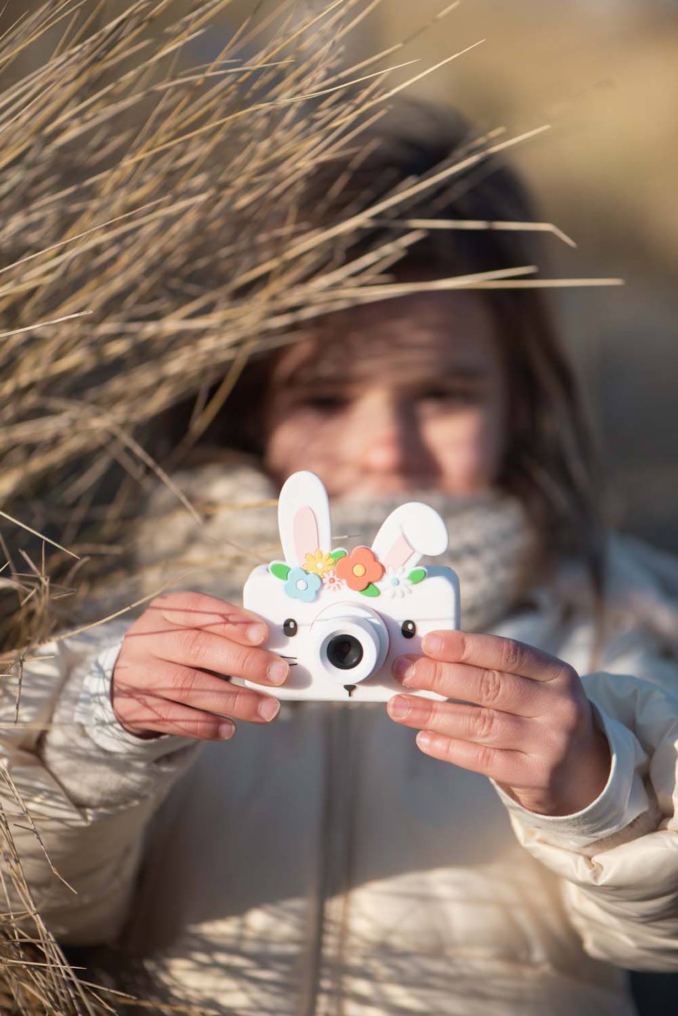 Appareil photo lapin des fleurs blanc, rose, vert