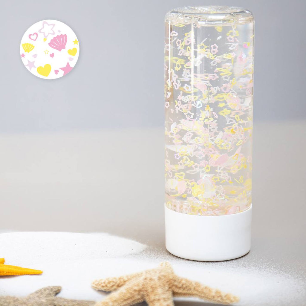 Bouteille sensorielle éveil et apaisement coquillages rose et jaune