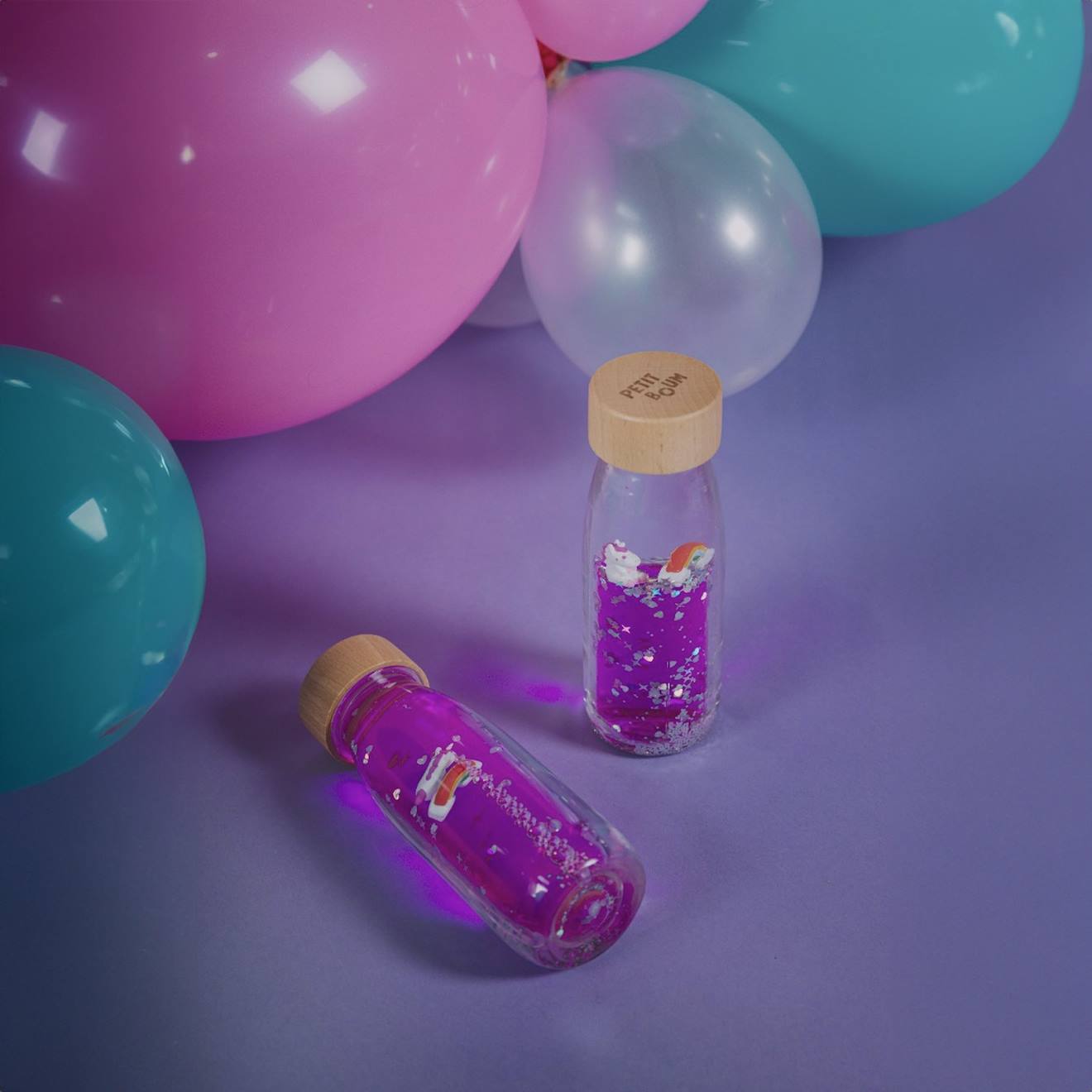 Bouteille sensorielle mouvement move violet, arc en ciel