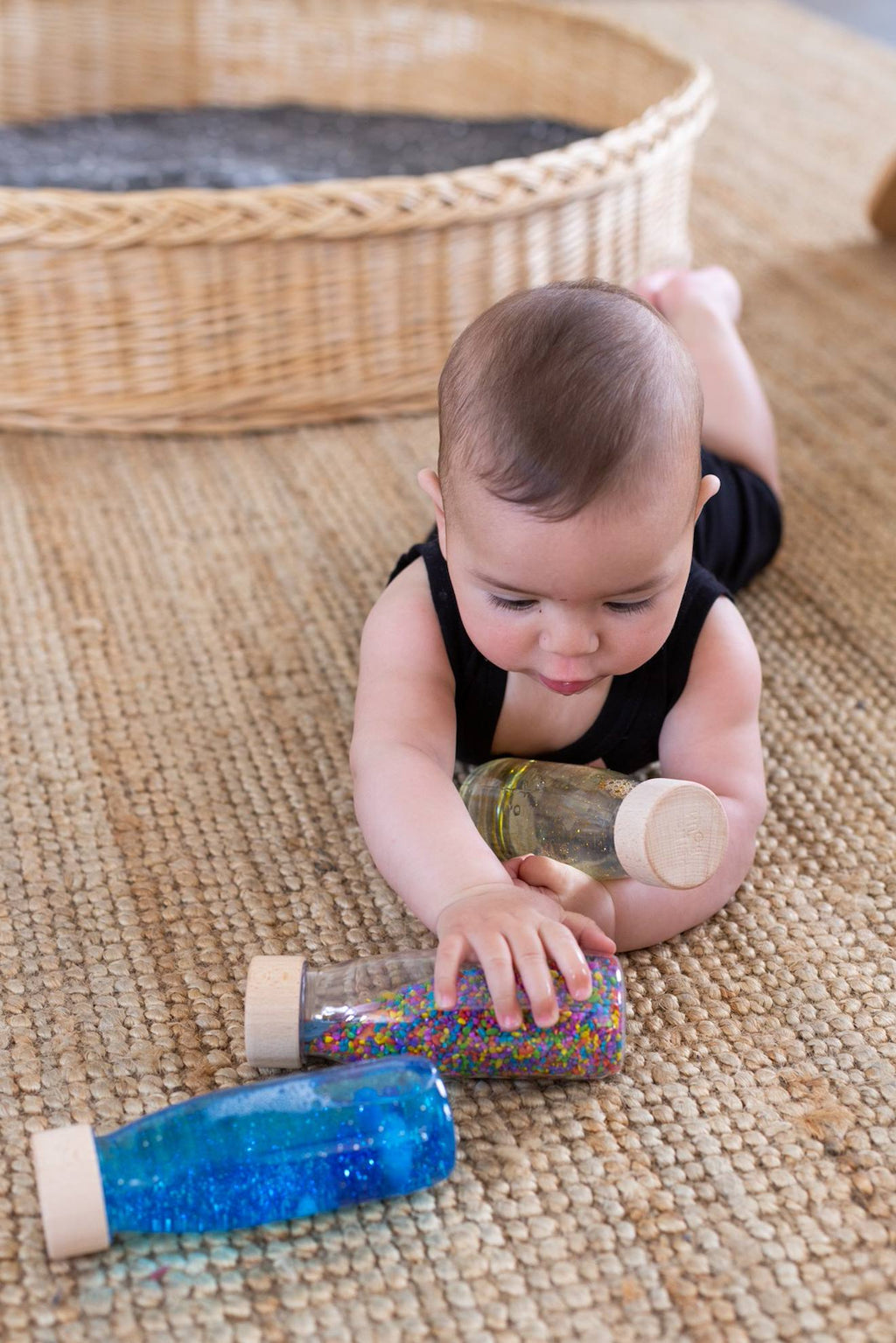 Bouteille sensorielle sound boutons multicolore