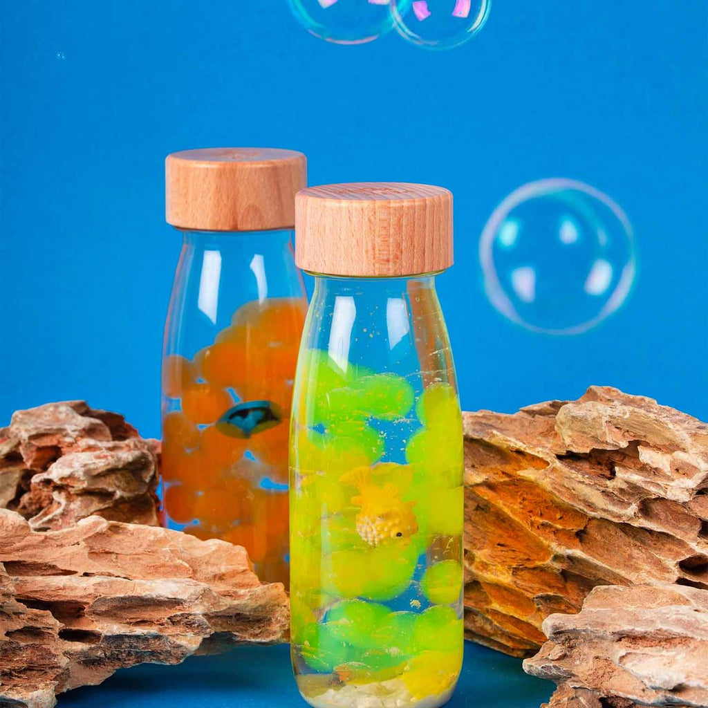 Bouteille sensorielle sound transparent, poisson orange