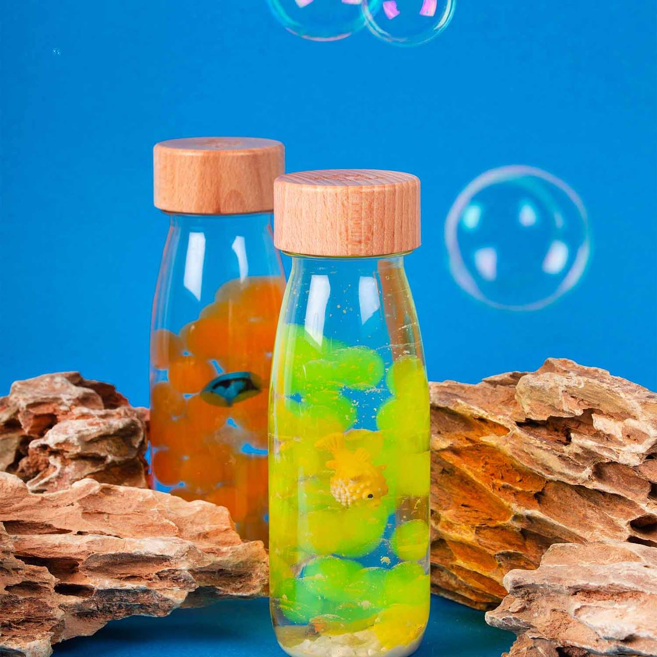 Bouteille sensorielle sound transparent, poisson orange