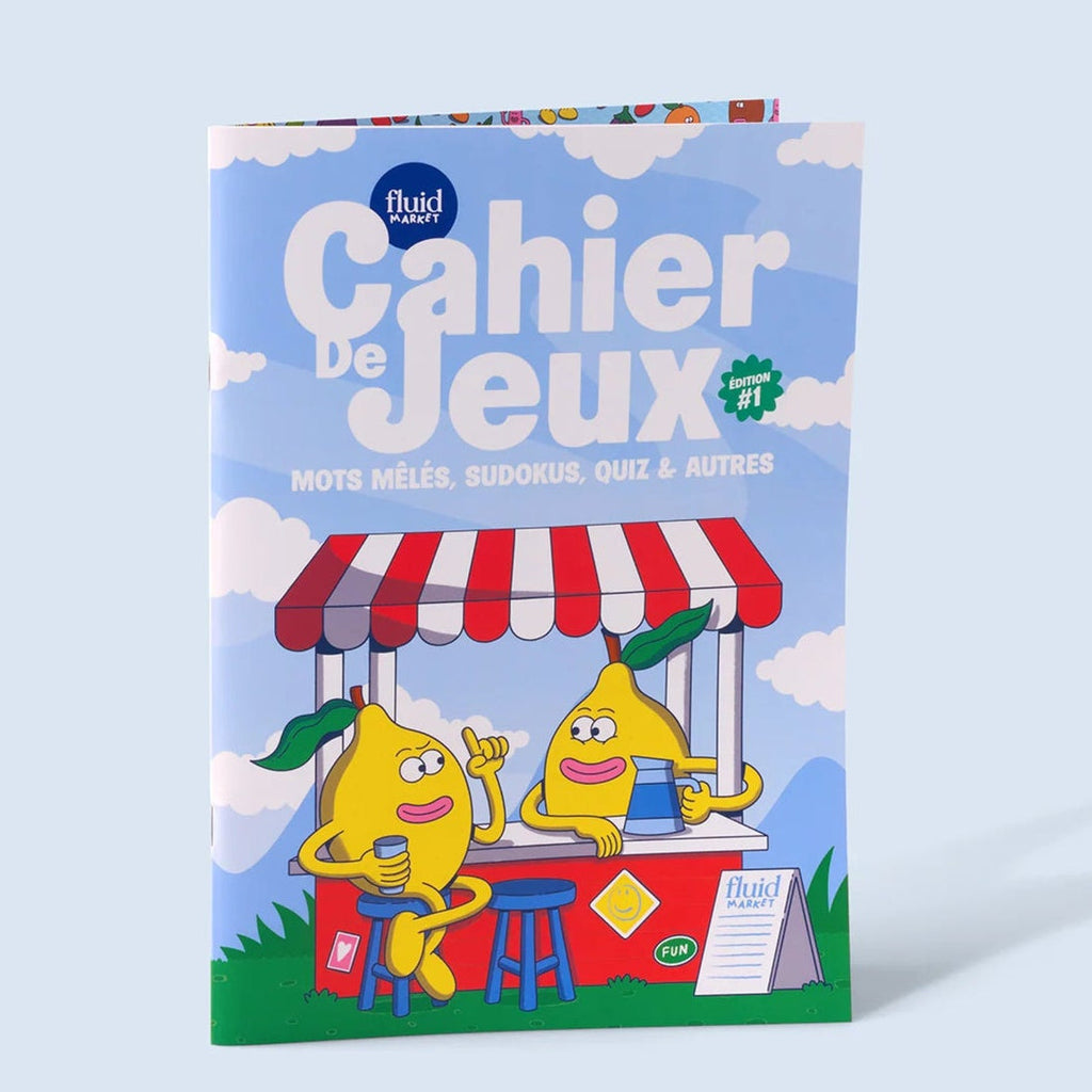 Cahier de jeux A4 ouvert avec sudokus et défis variés
