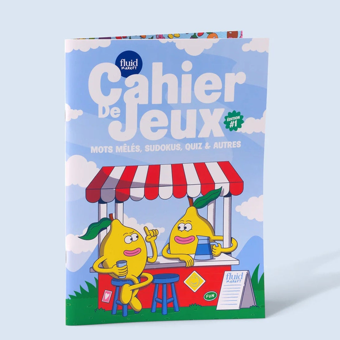 Cahier de jeux A4 ouvert avec sudokus et défis variés