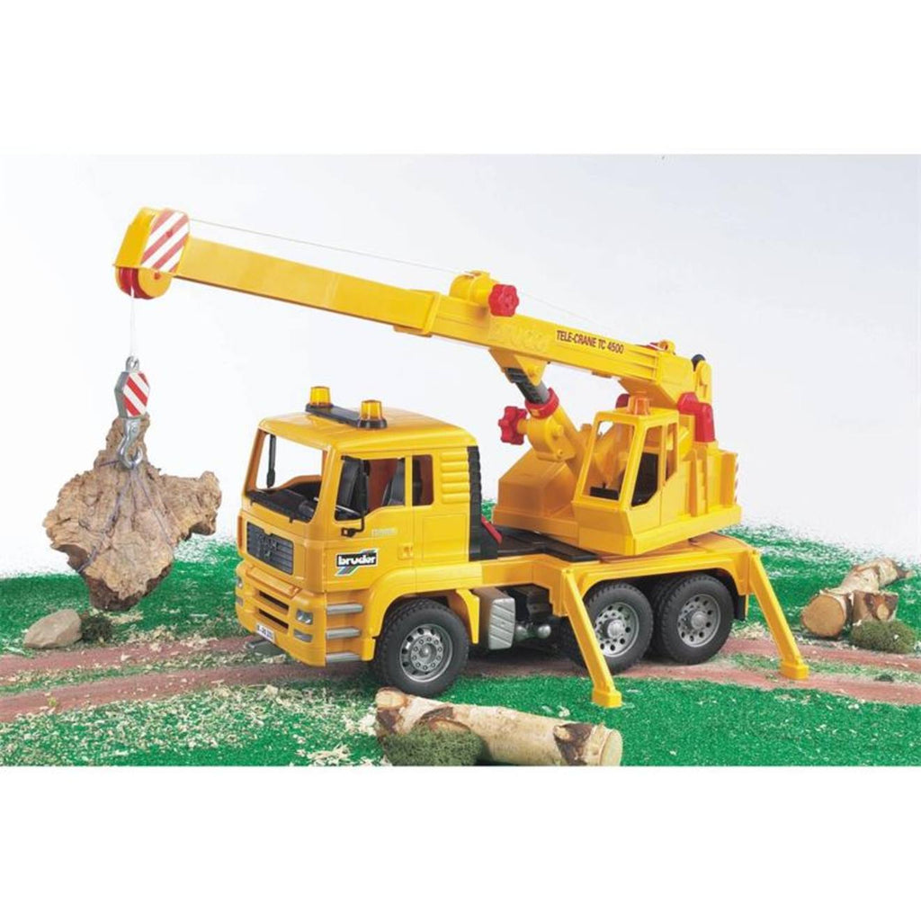 Camion grue man tga jaune