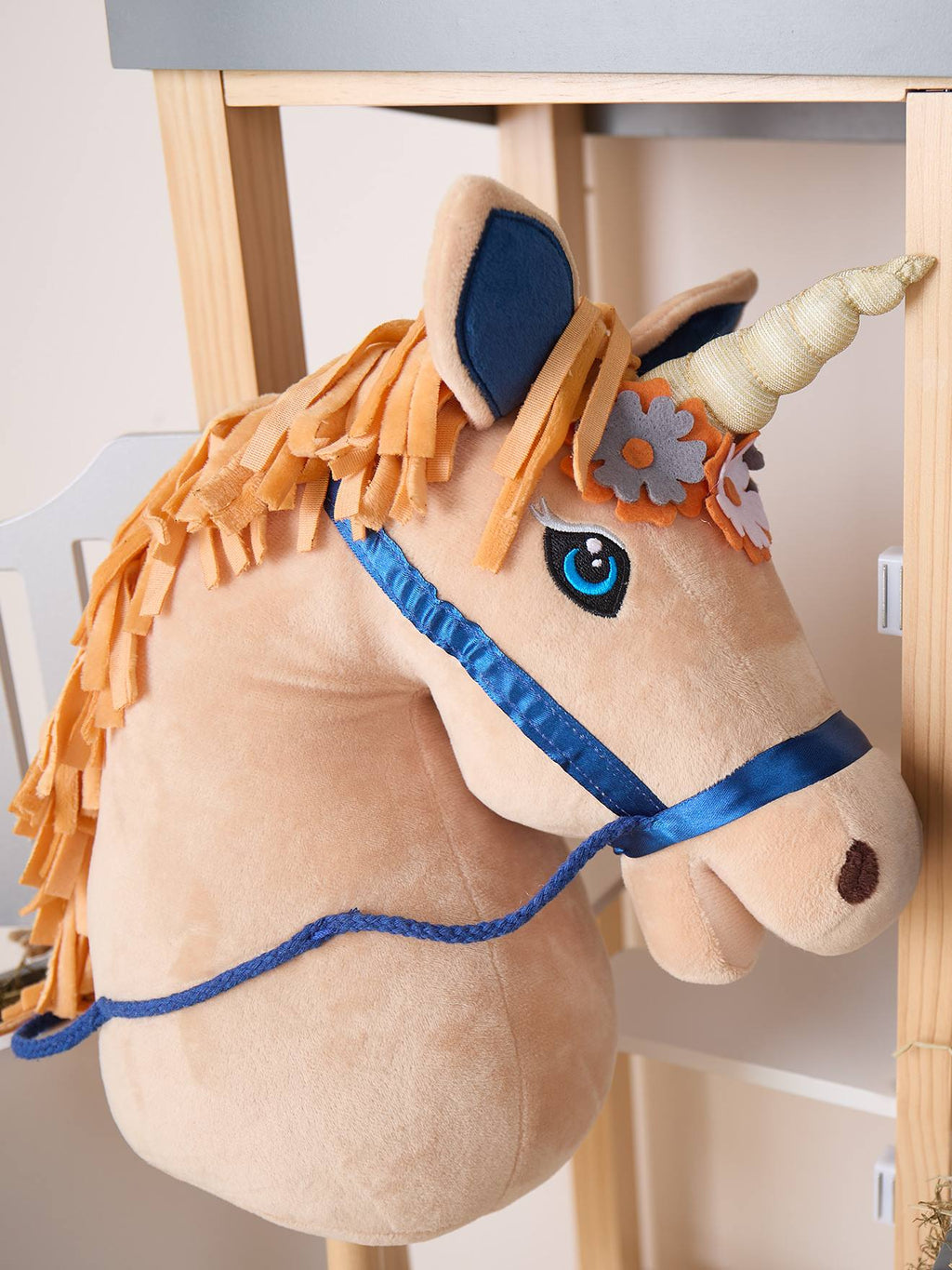 Cheval bâton brownie avec roulettes magic