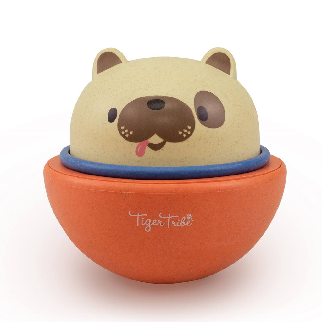 Chien culbuto et véhicule à friction rose