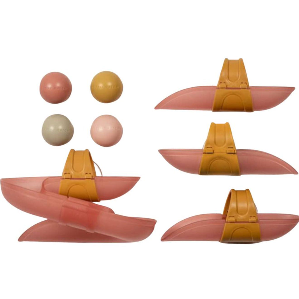 Circuit de bain avec balles bleu rose, doré