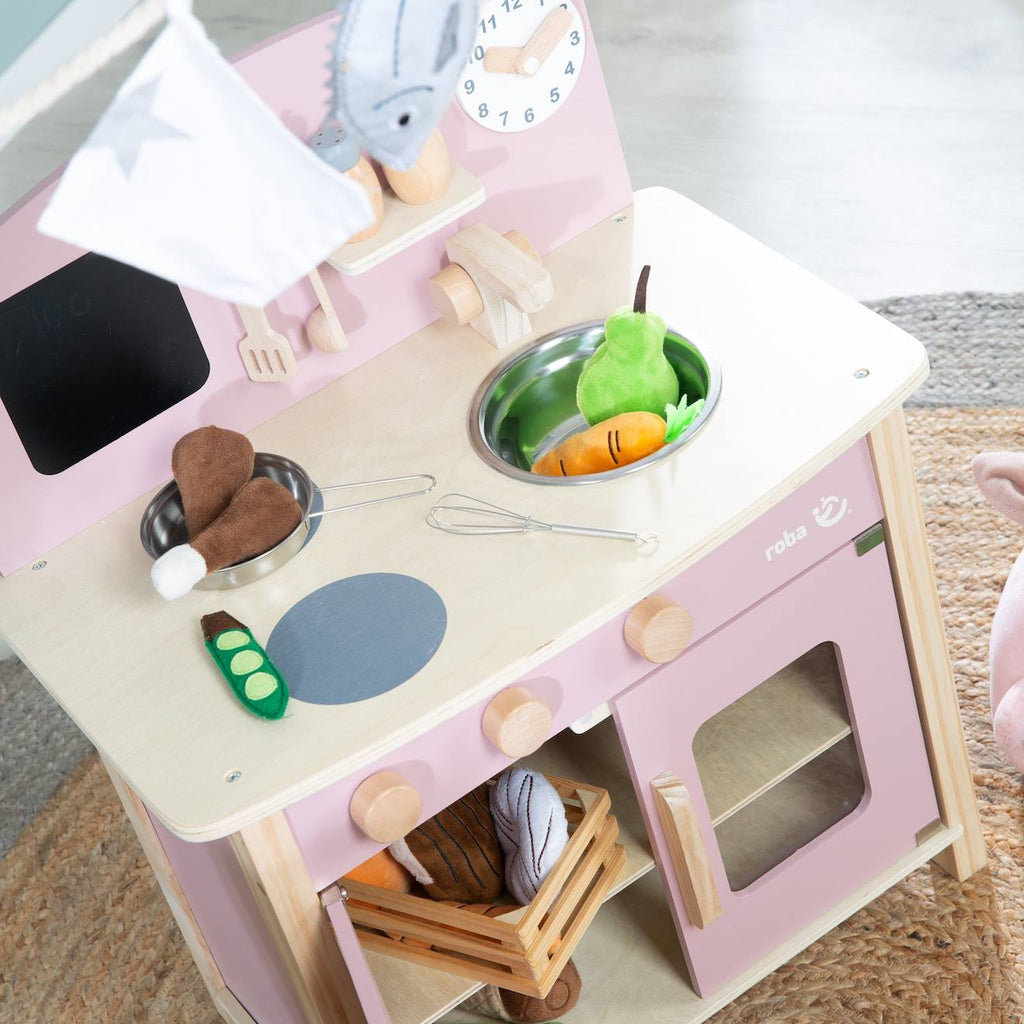 Cuisine enfant équipée avec accessoires et horloge rose et naturel