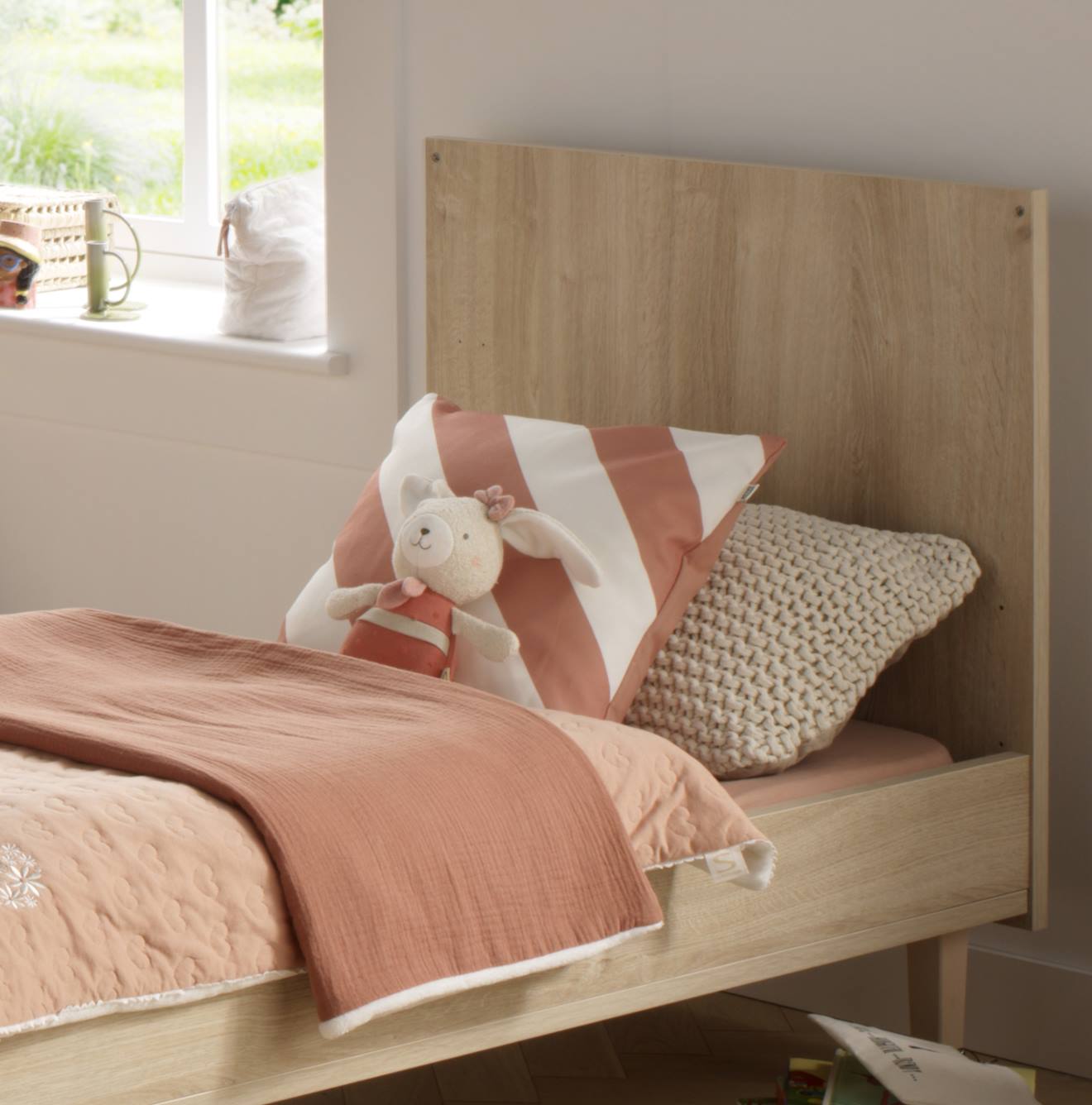 Doudou en coton bio - petit soleil rose
