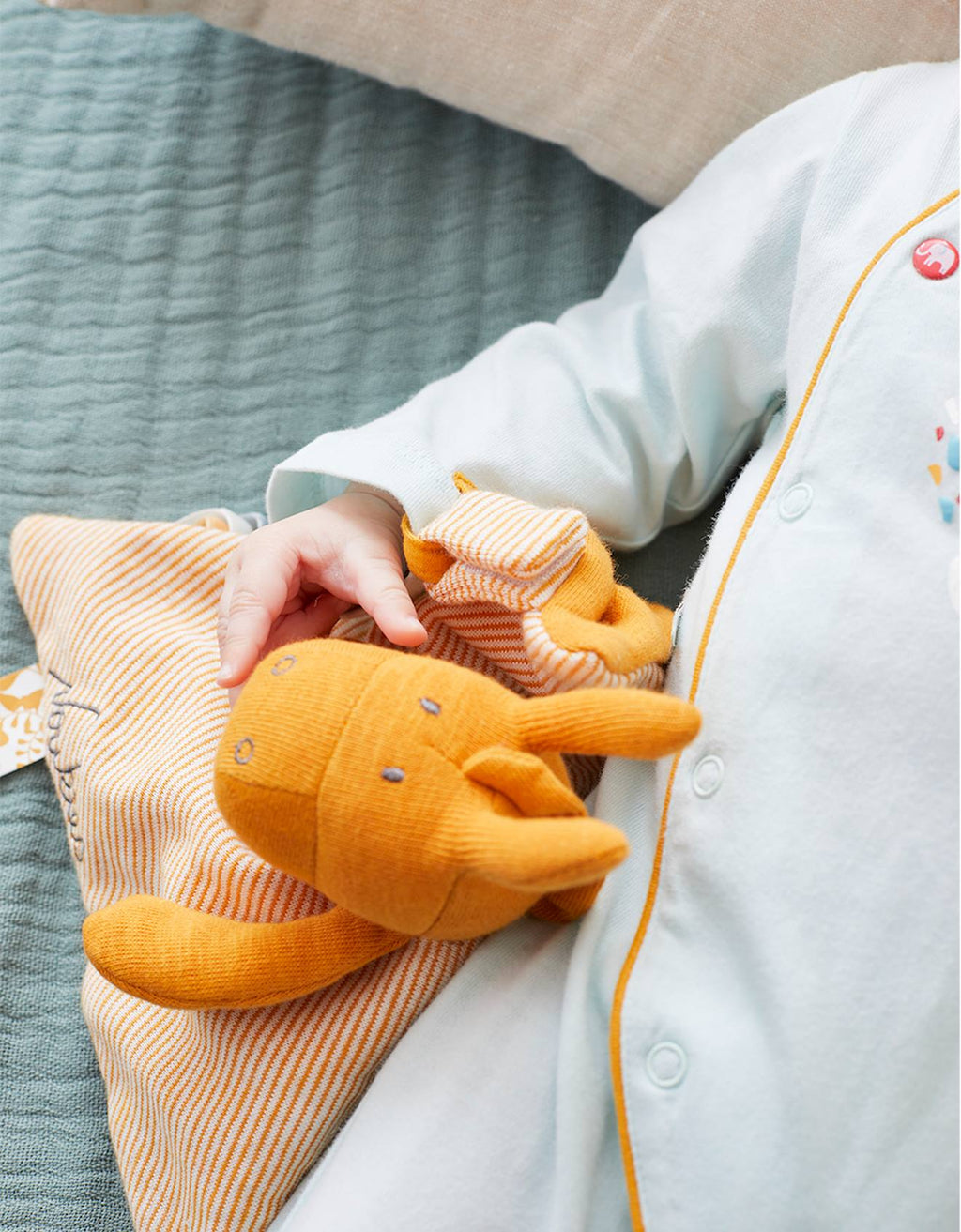 Doudou paco en coton bio orange