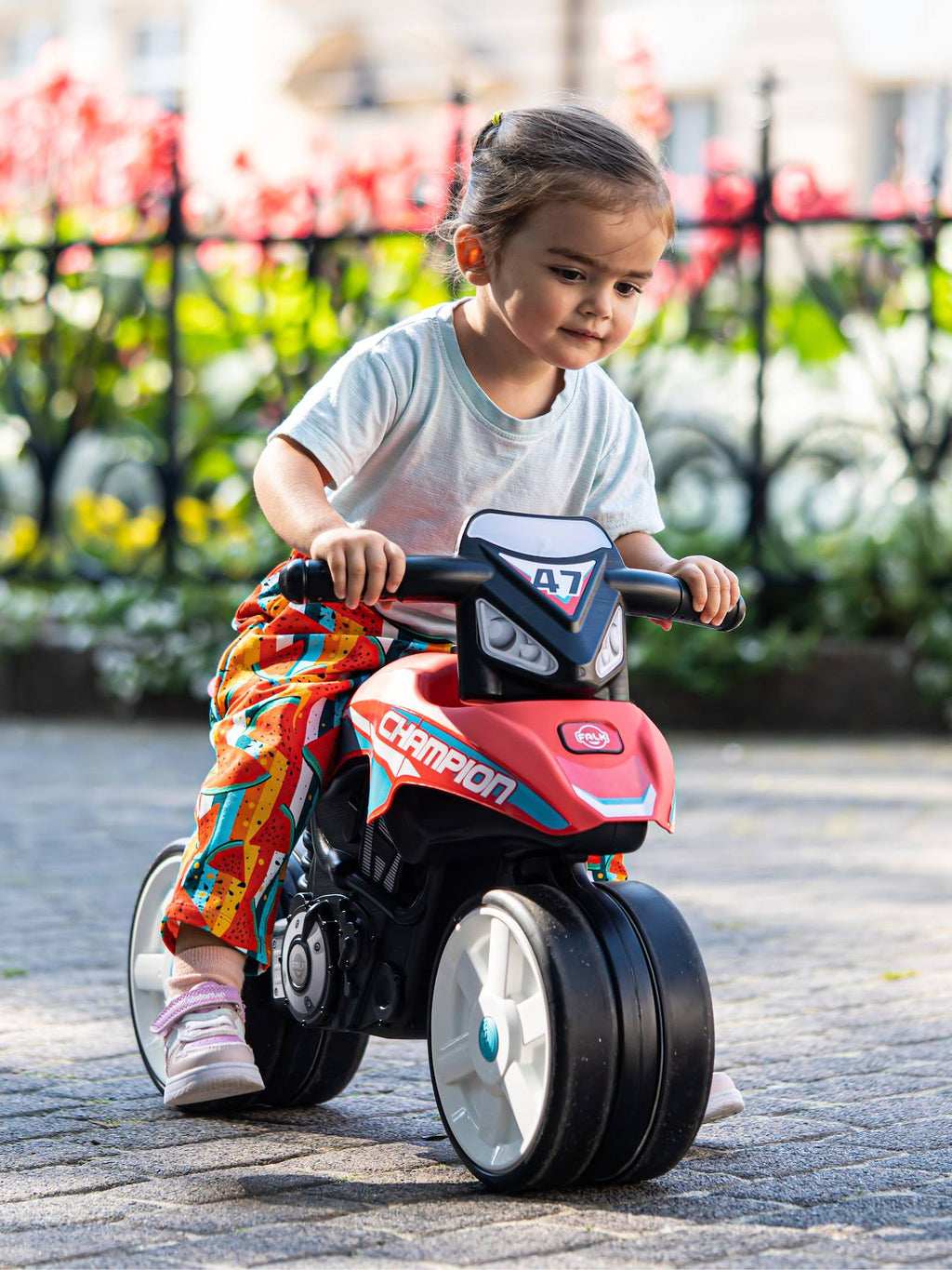 Draisienne moto street avec roues silencieuses rouge corail
