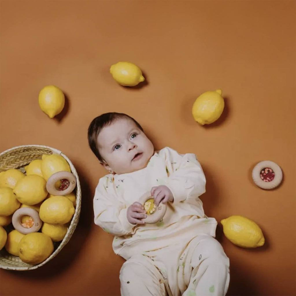 Hochet sensoriel donut fruits jaune