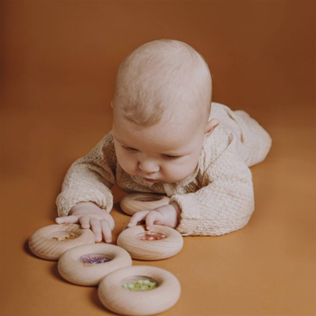 Hochet sensoriel donut fruits vert