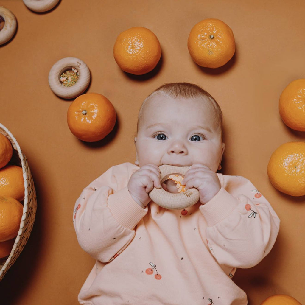 Hochet sensoriel donut fruits orange