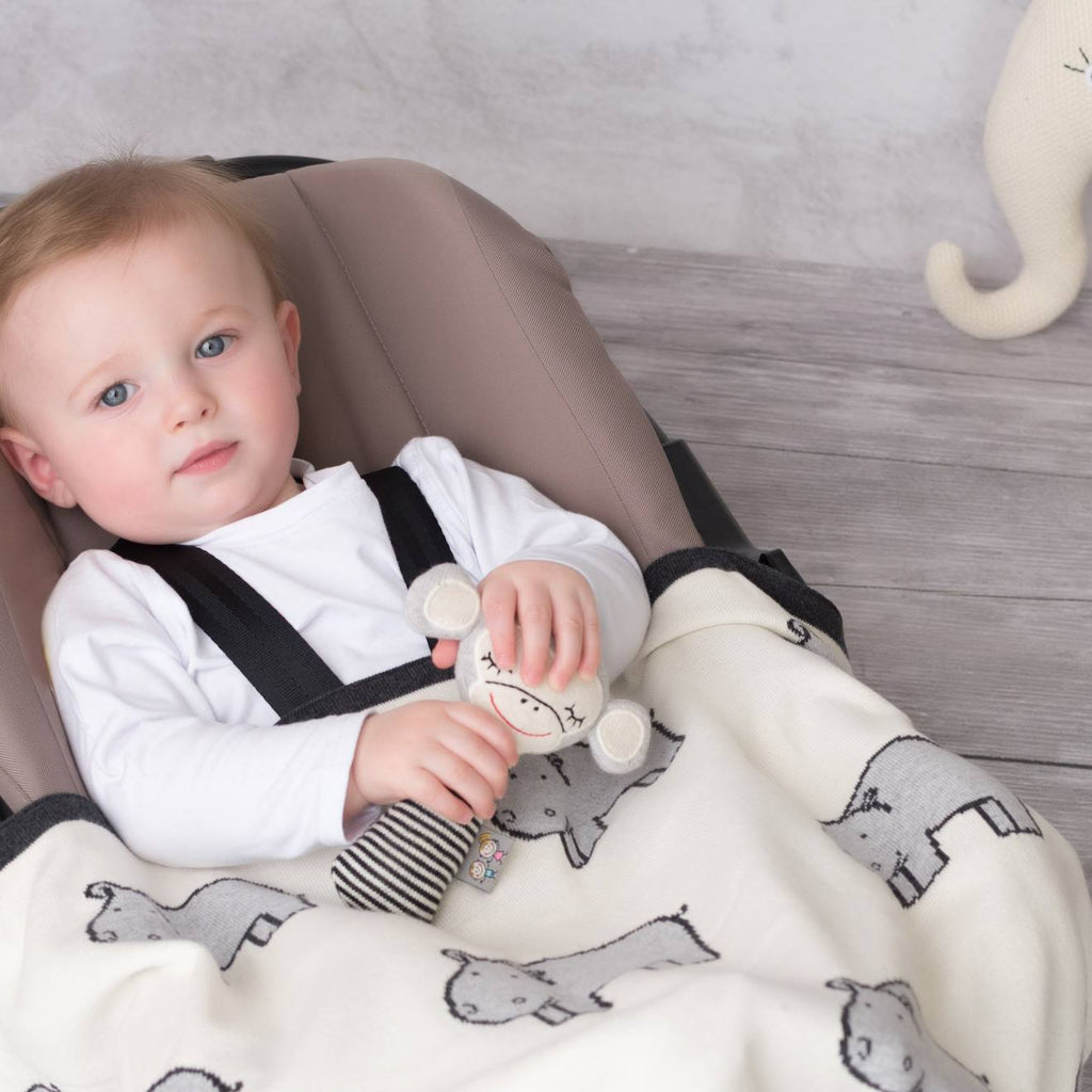 Hochet tricoté en coton bio beige, singe