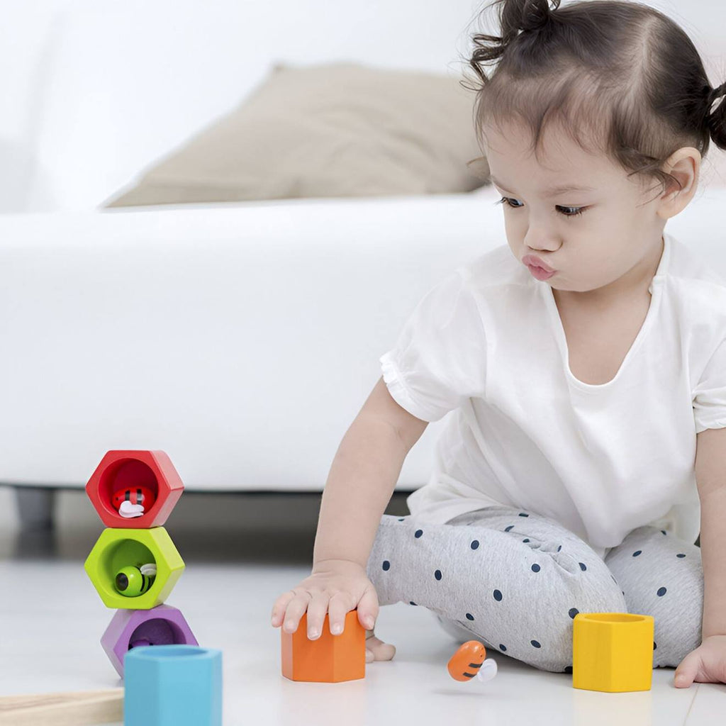 Jeu de pince nids d'abeilles multicolore