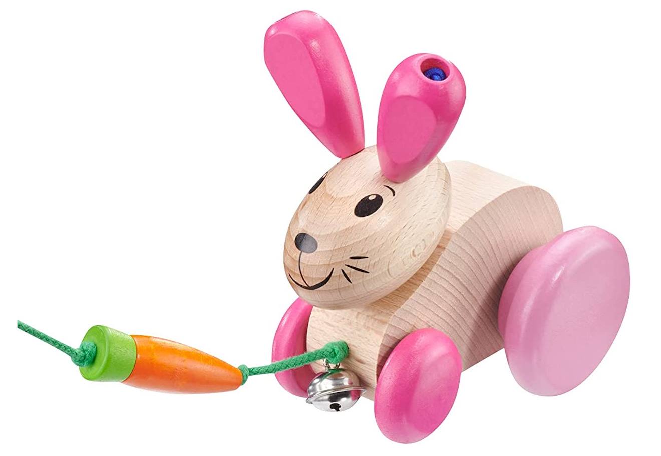 Lapin en bois massif à tirer rose