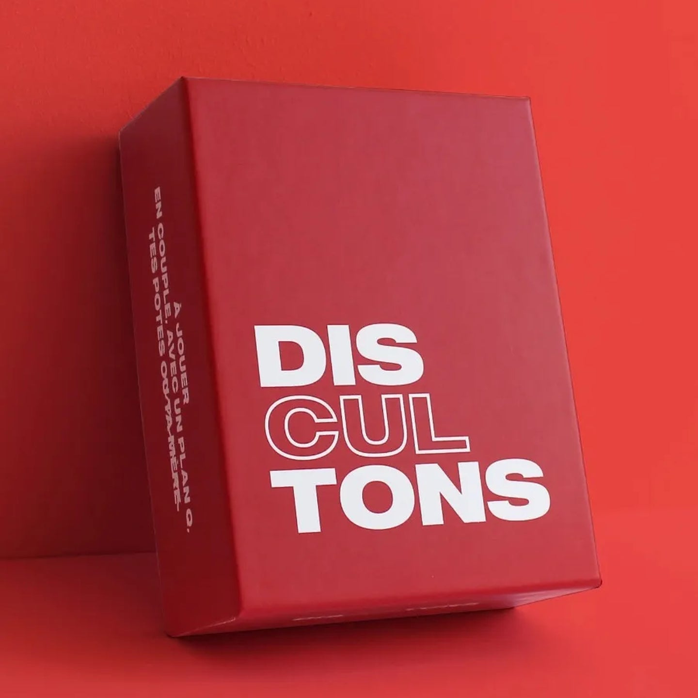 Boîte du jeu de cartes Discultons au design coloré
