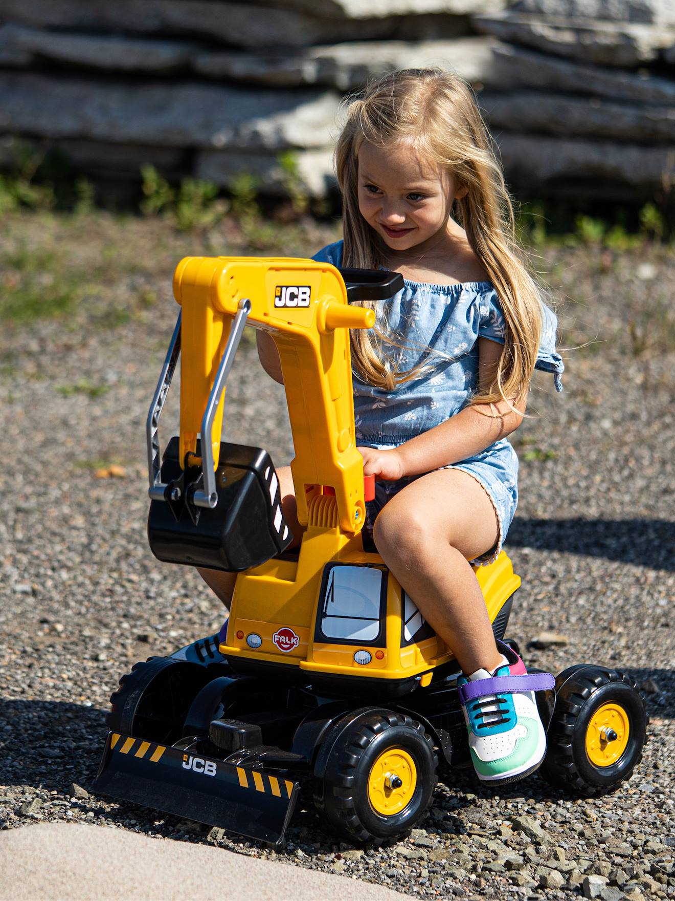 Pelleteuse super builder entièrement articulée avec assise ouvrante jaune jcb