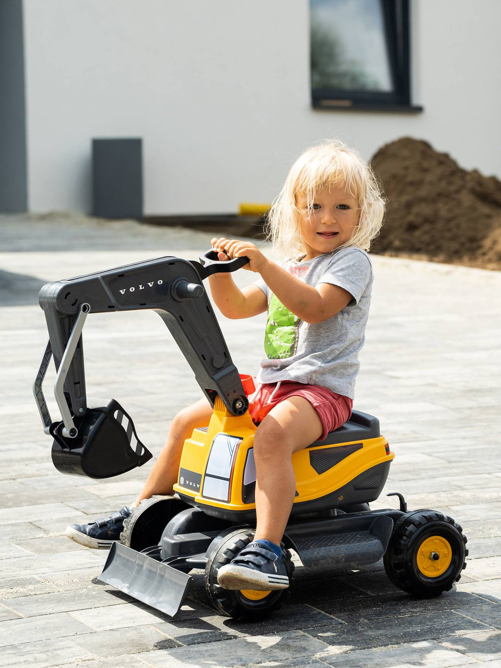 Pelleteuse super builder entièrement articulée avec assise ouvrante jaune et anthracite - volvo