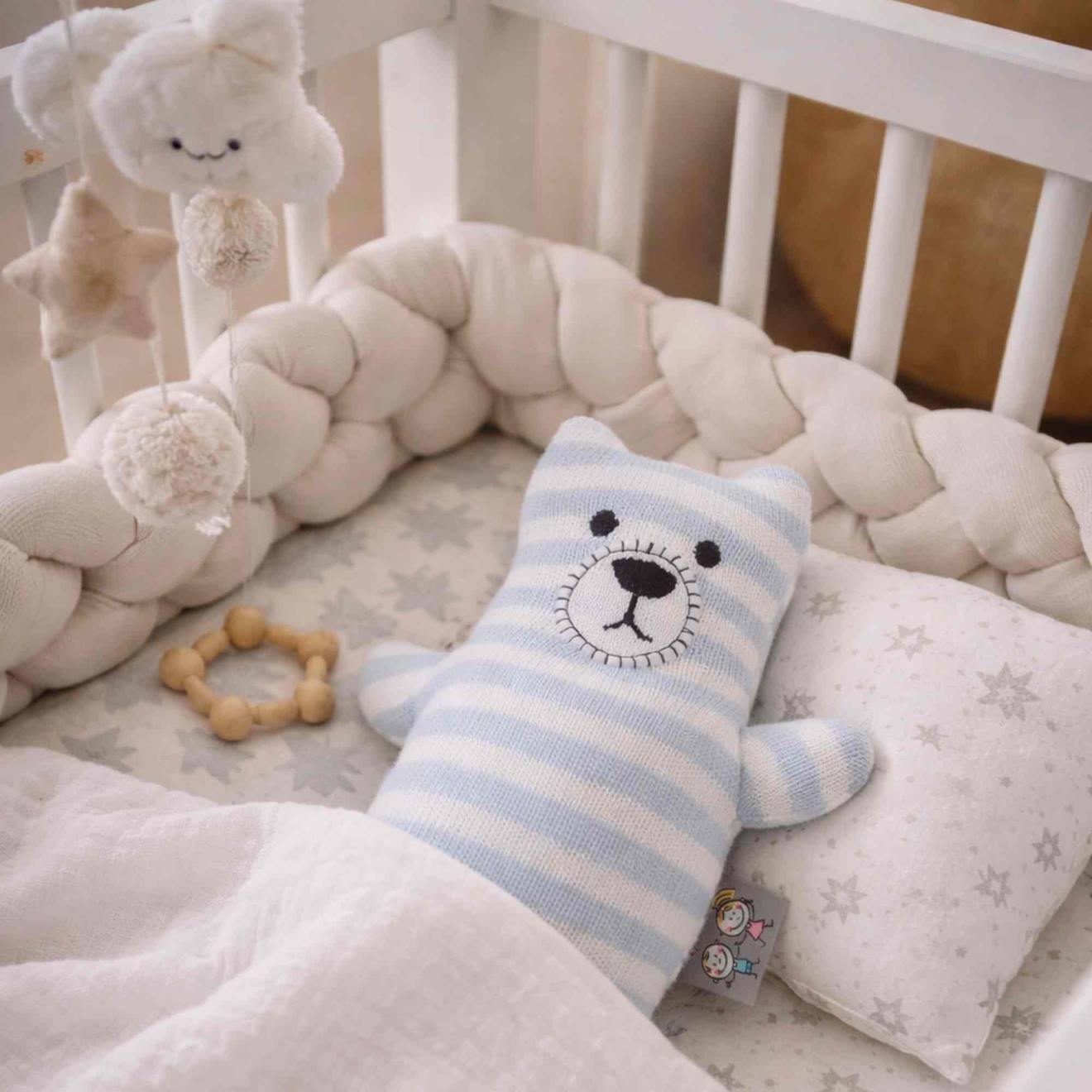 Peluche doudou ourson en coton tricoté bleu
