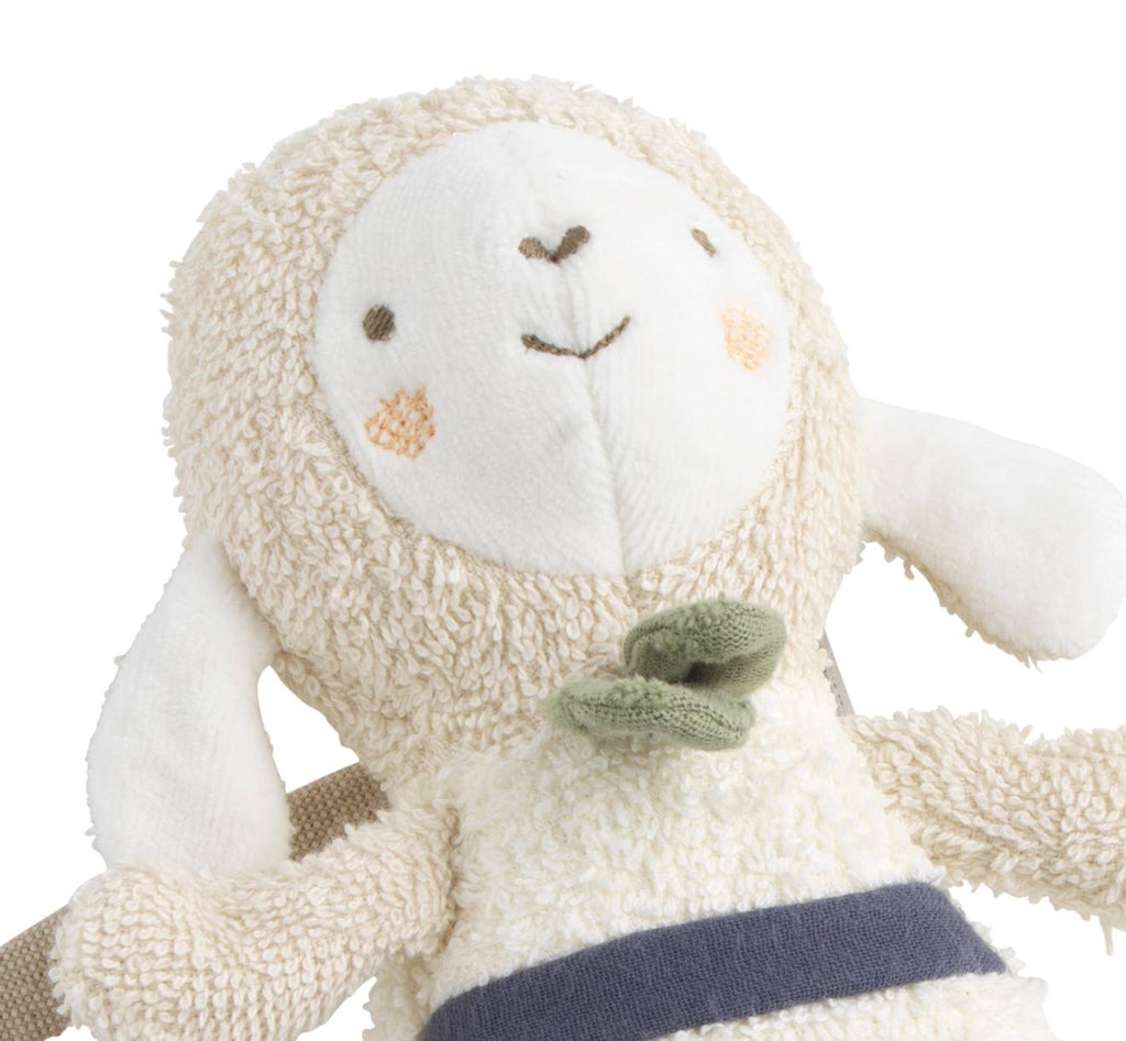 Peluche mini musical en bouclette coton bio - petit soleil beige/bleu