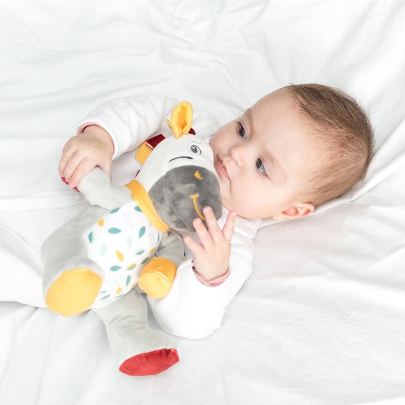 Peluche musicale zèbre multicolore