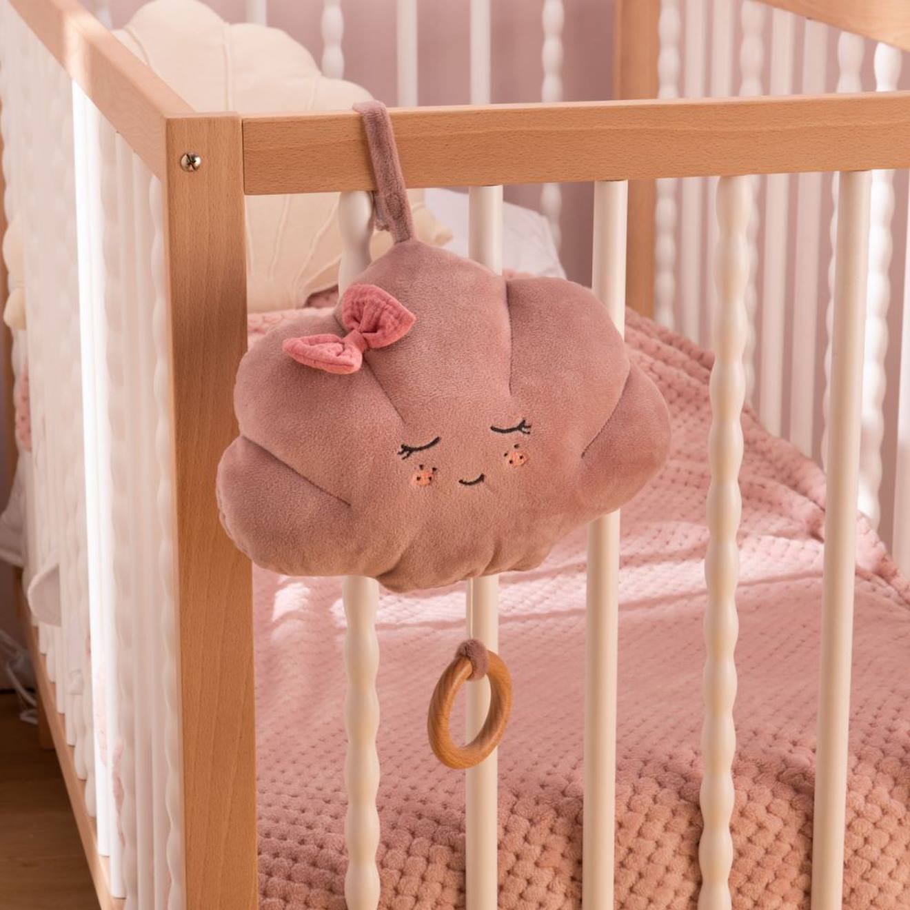 Peluche musicale violet, rose, noir