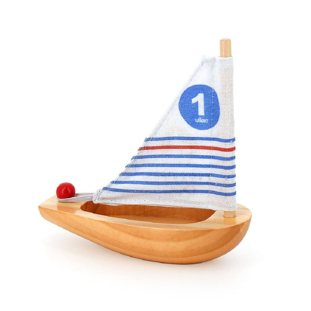 Petit voilier de bain beige