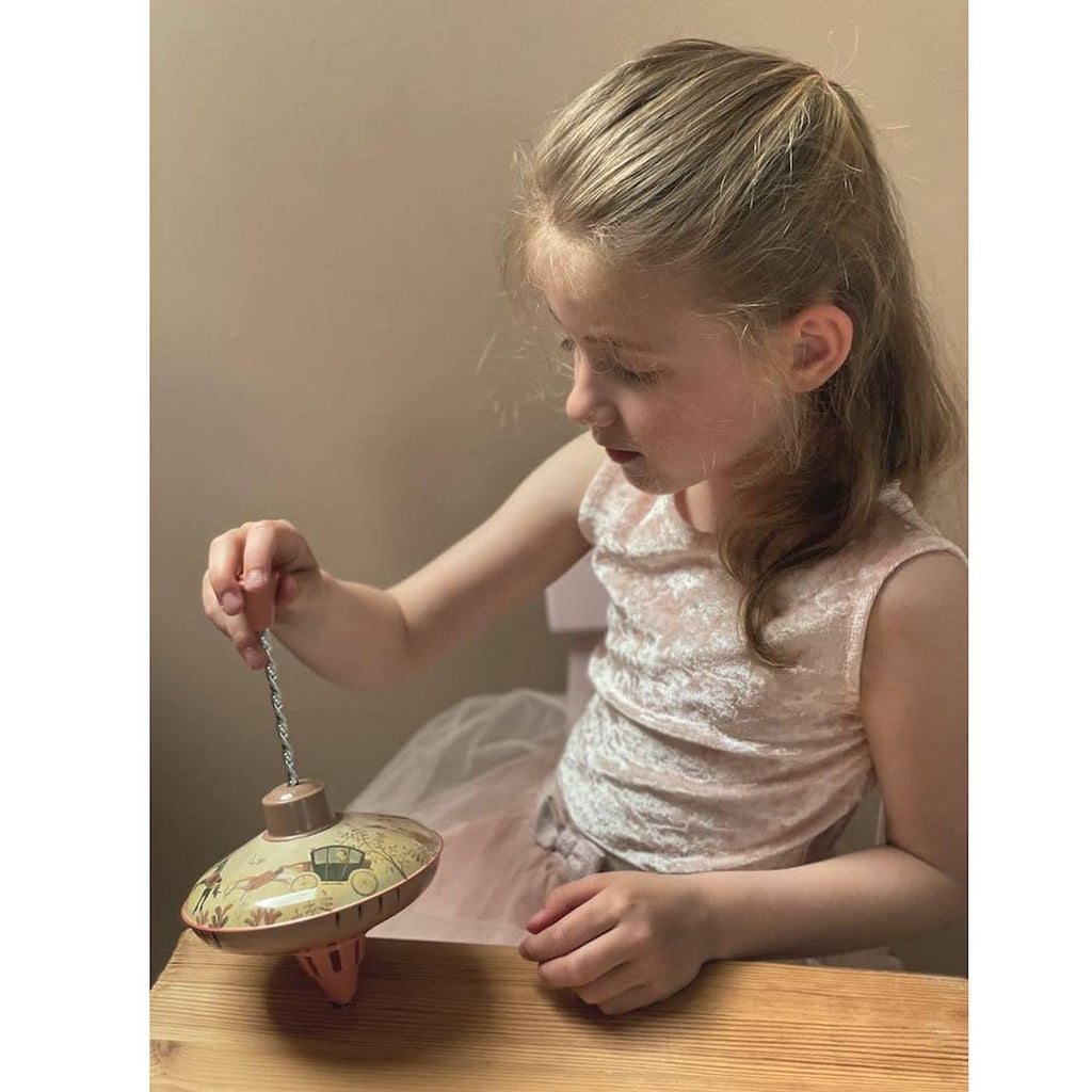 Petite toupie princesse beige