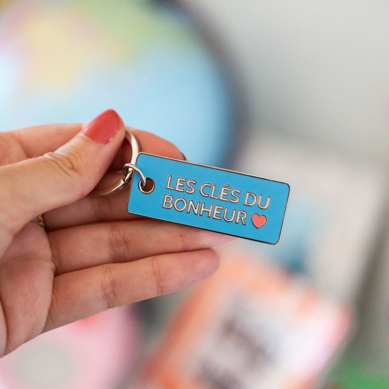 Porte-clés Les clés du bonheur sur fond blanc