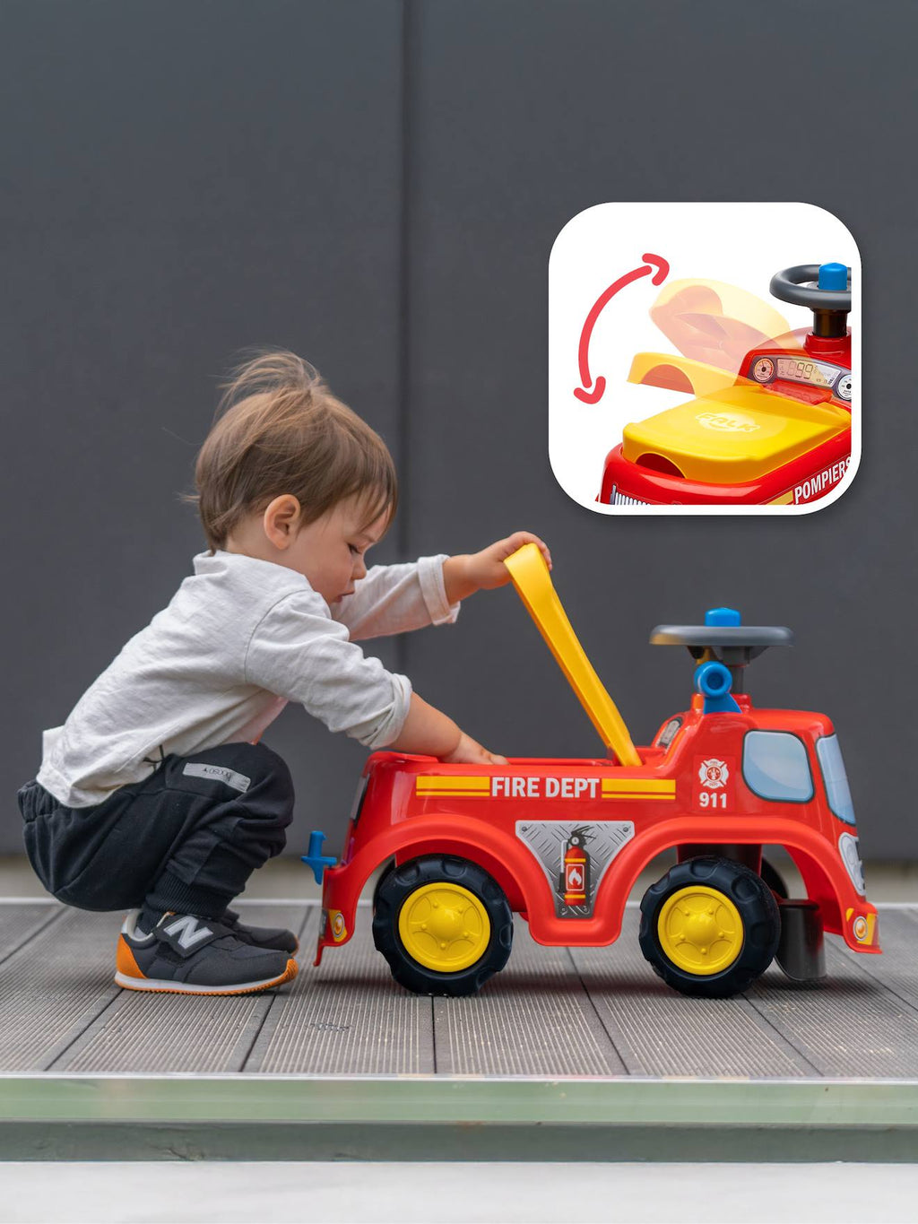 Porteur avec assise ouvrante et volant directionnel avec klaxon rouge