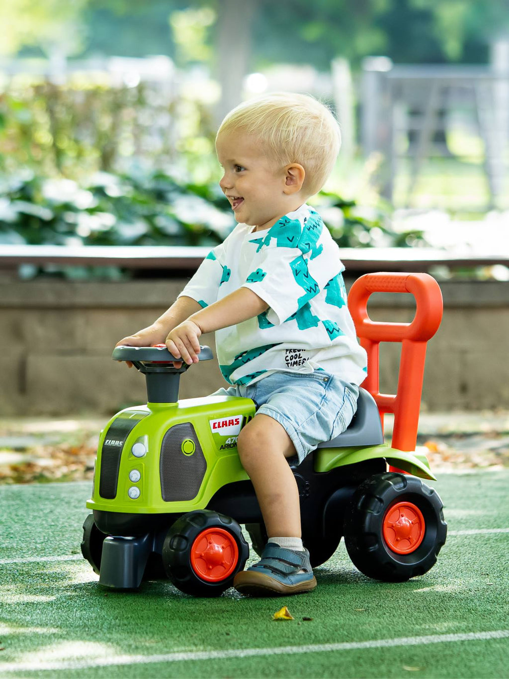 Porteur tracteur claas 1er âge avec barre d'aide à la marche vert claas