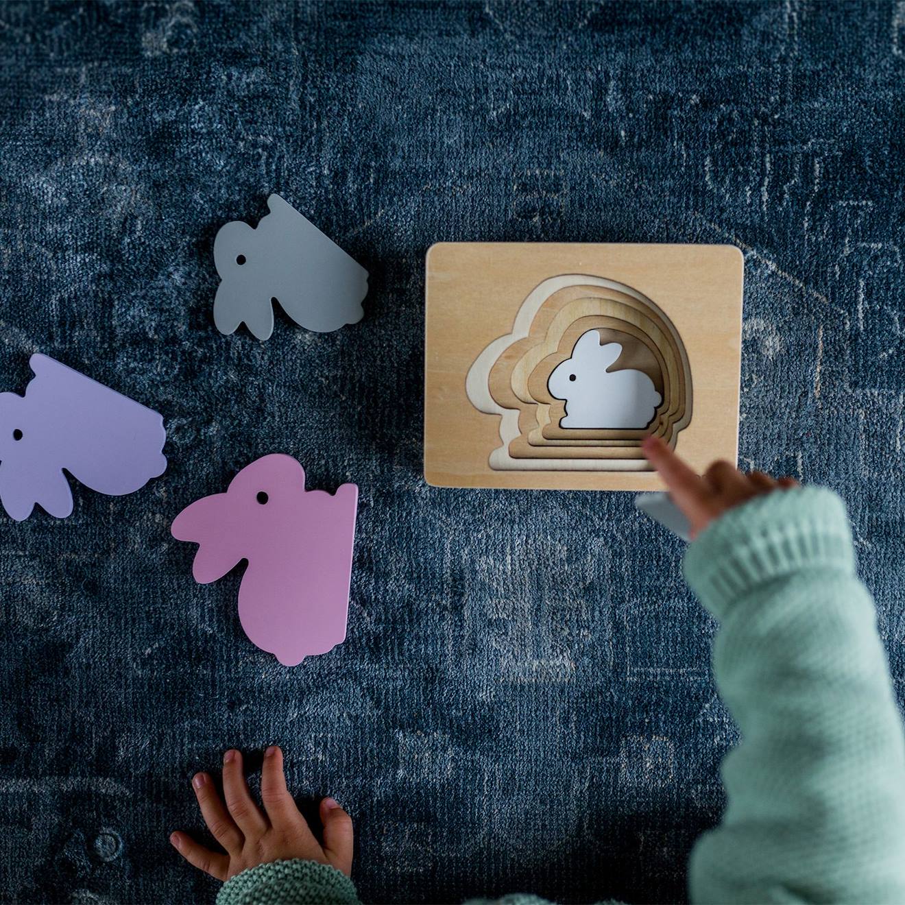 Puzzle animal en bois rose pâle