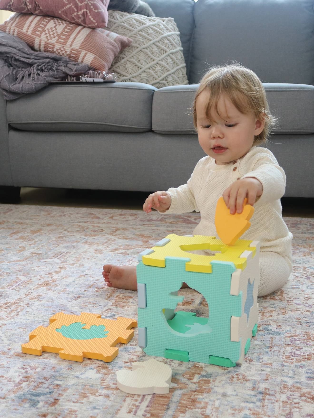 Puzzle sensoriel en mousse multicolore
