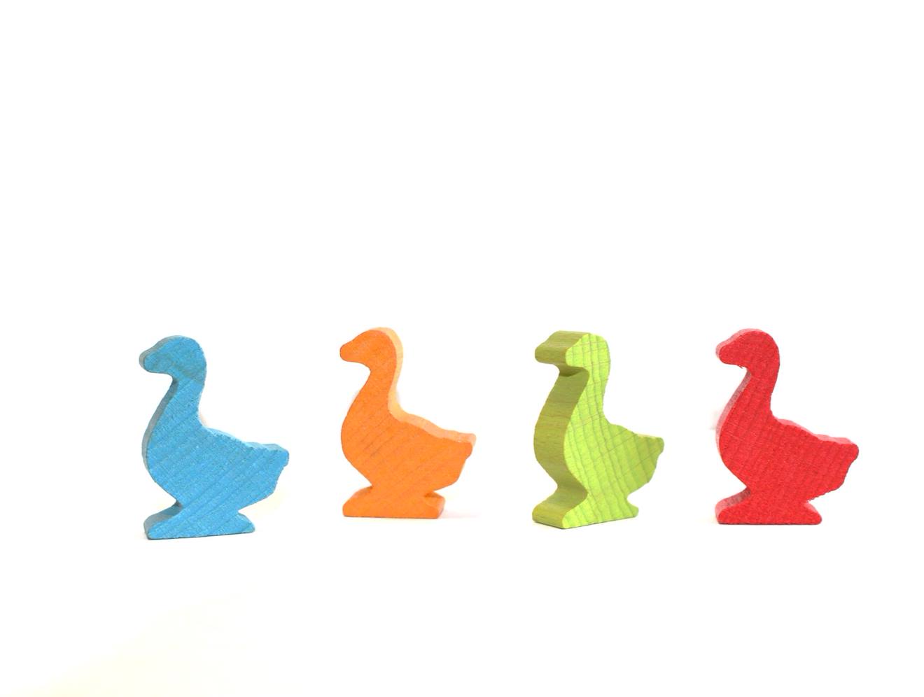 Sachet de 4 oies en bois rouge