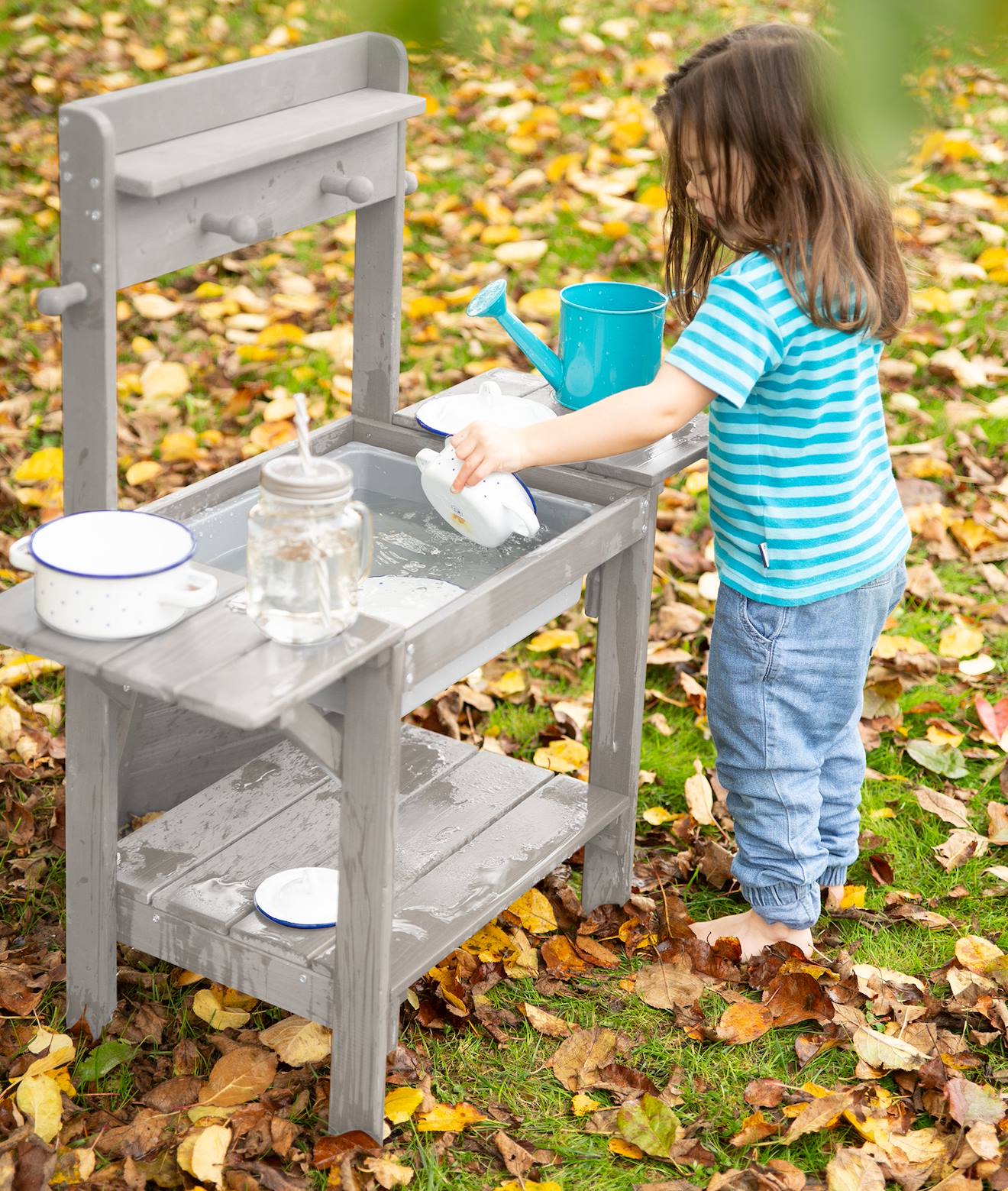Table sable et eau en bois massif lasuré gris