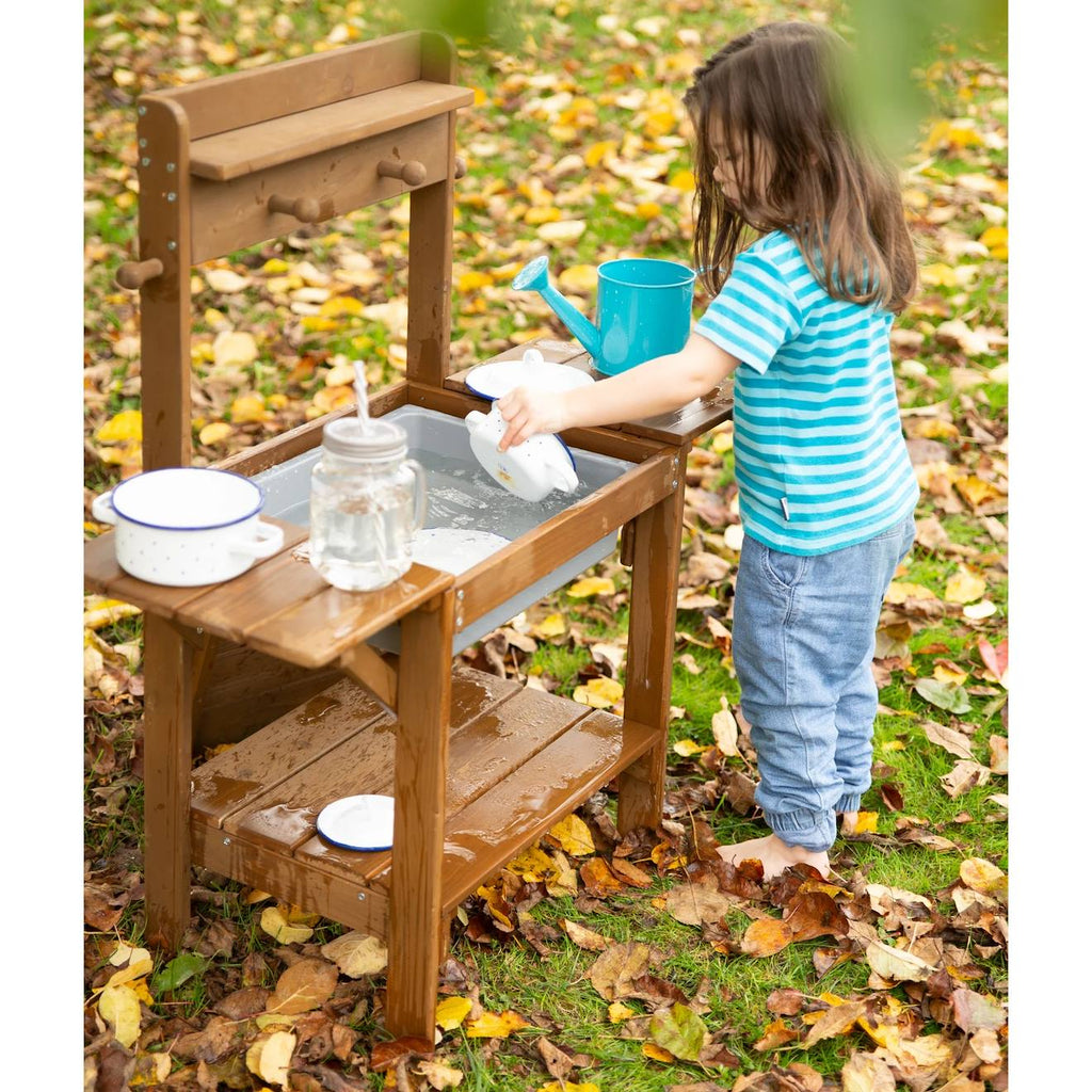 Table sable et eau en bois massif lasuré teck