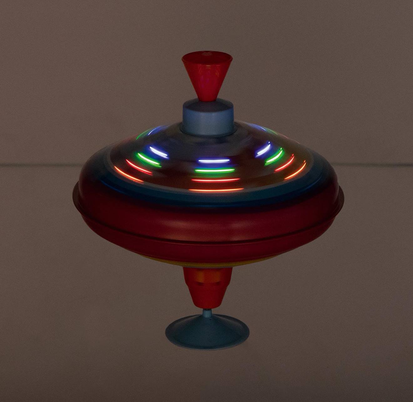 Toupie bourdonnante LED poussière d'étoiles rose