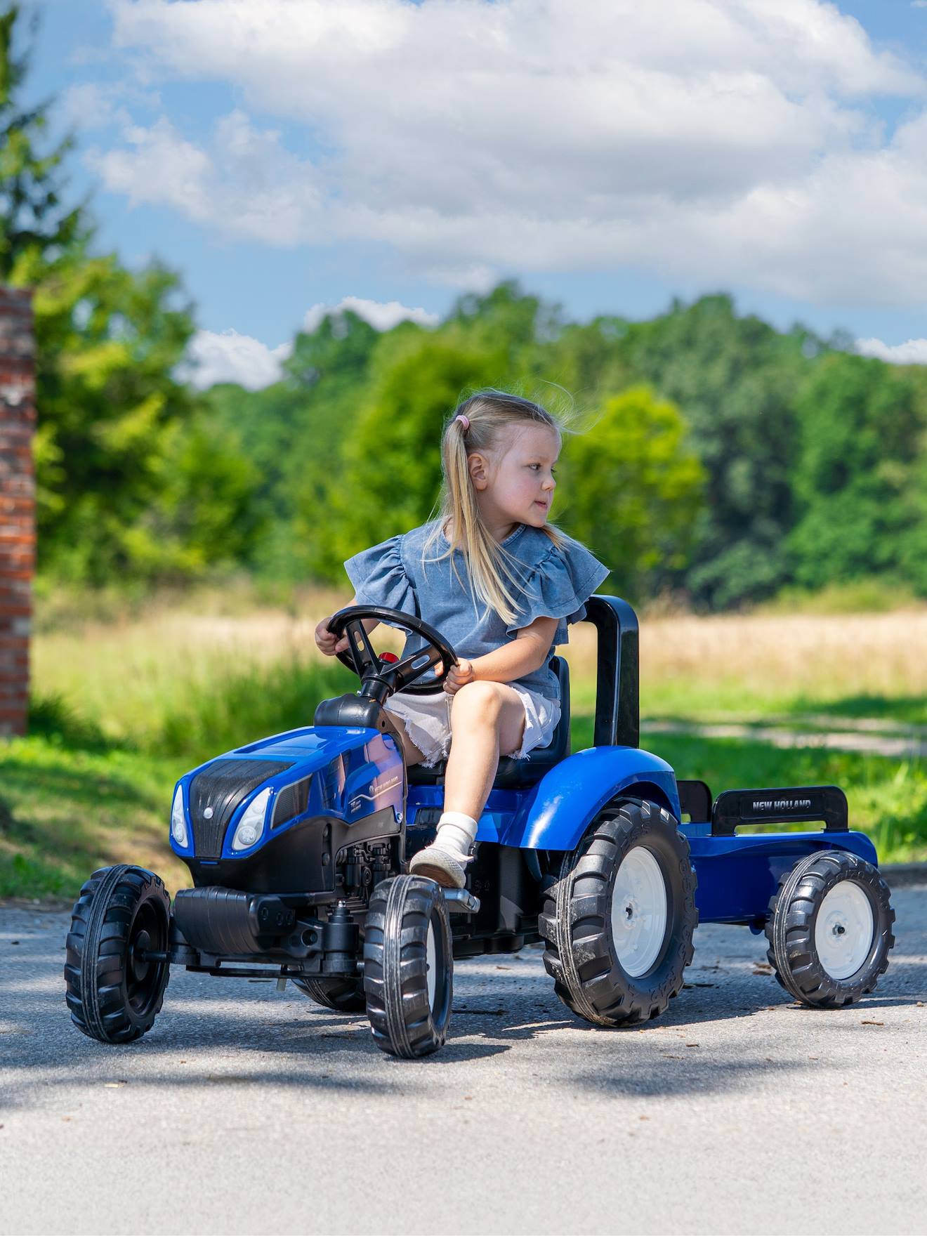 Tracteur à pédales avec remorque bleu new holland