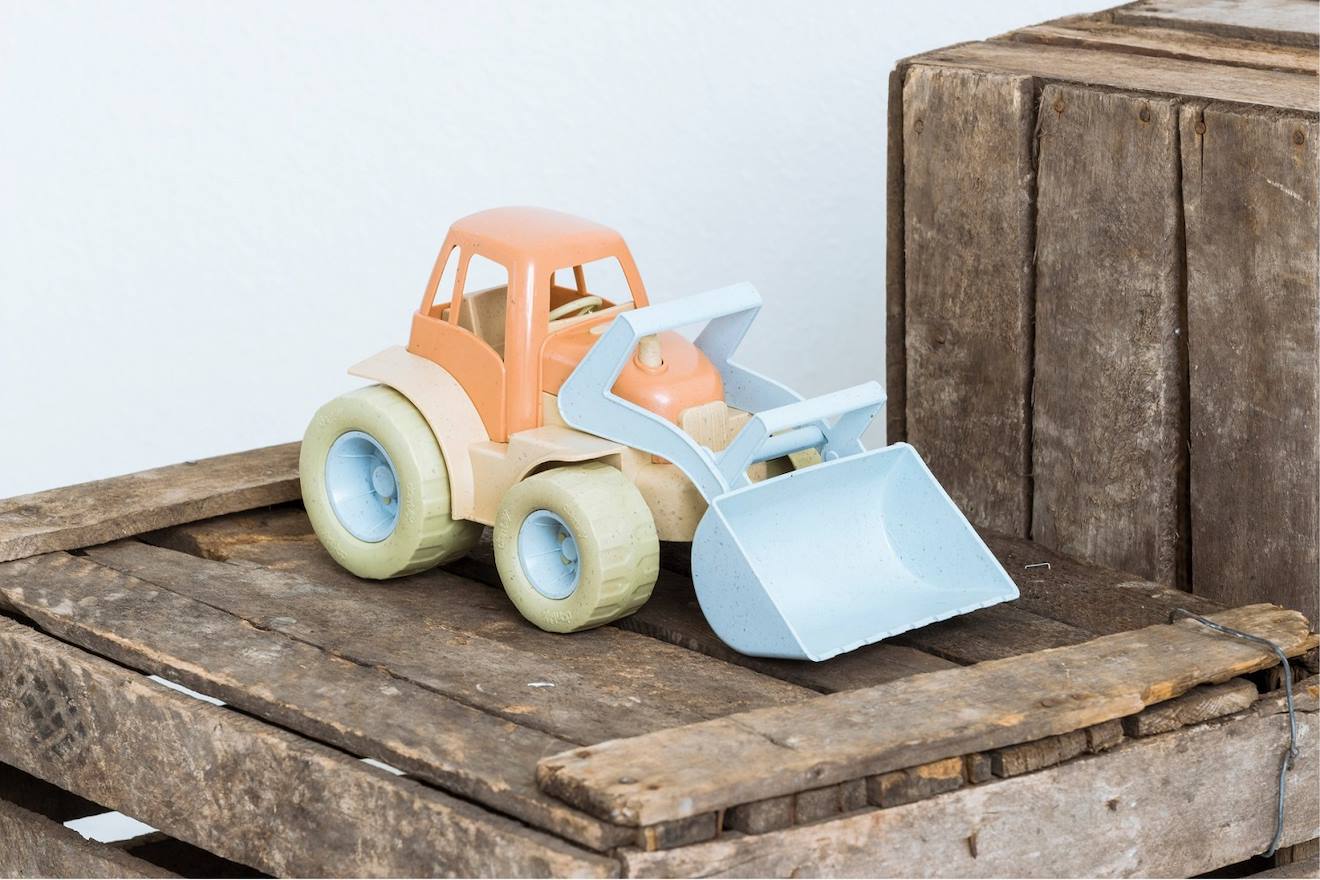 Tracteur pelleteuse en bioplastique orange