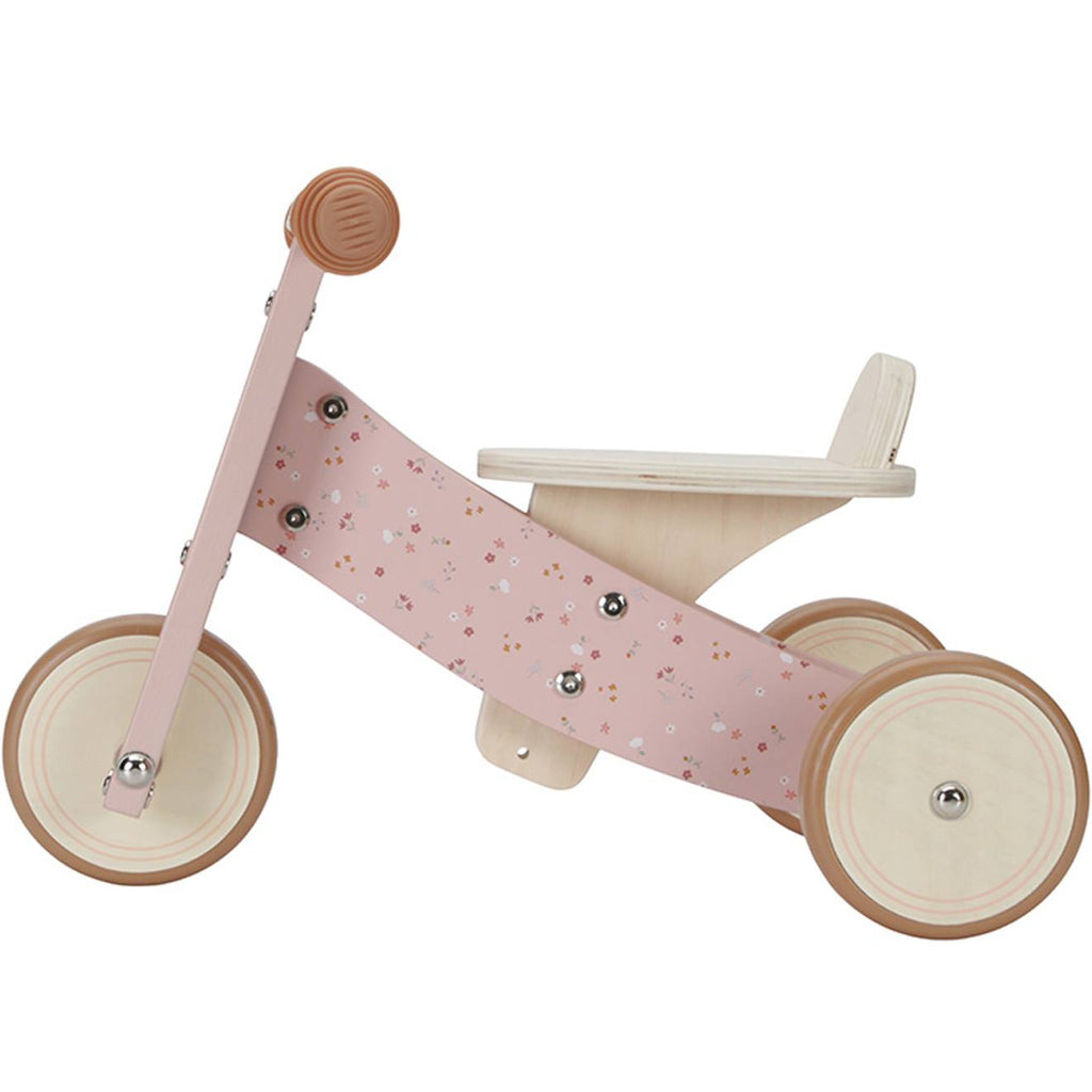 Tricycle en bois rose